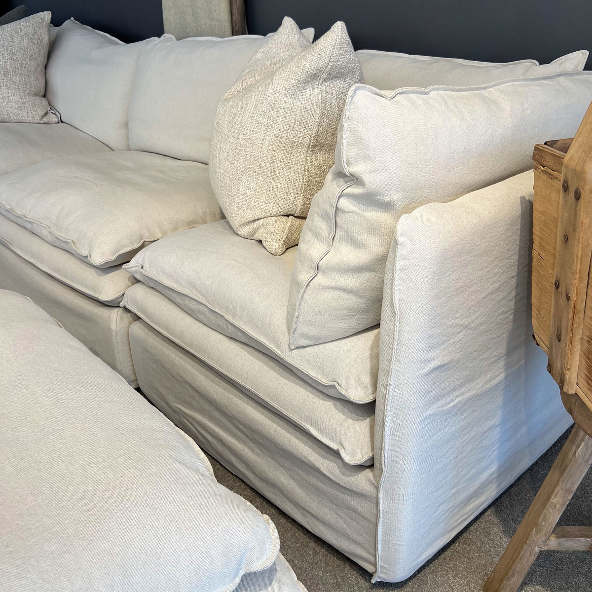 Laguna Slipcover Sectional Sofa - Corner Setting + Ottoman