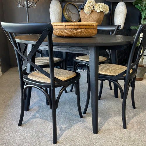 round black dining table with black chaors