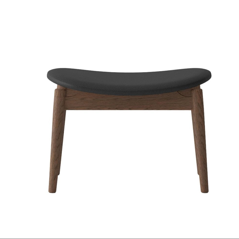 Stool with black seat and wooden legs on a white background