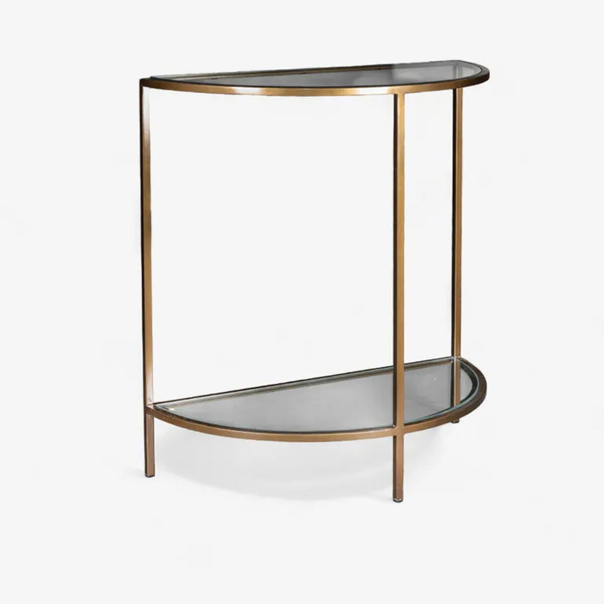 Small curved table with glass top and bronze metal frame on a white background