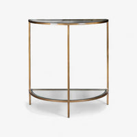 Half-moon console table with glass top and bronze metal frame on a white background