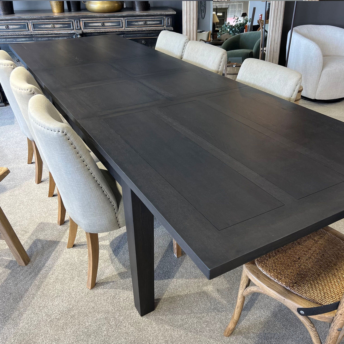 Dining table with chairs in a room setting