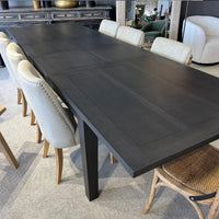 Dining table with chairs in a room setting