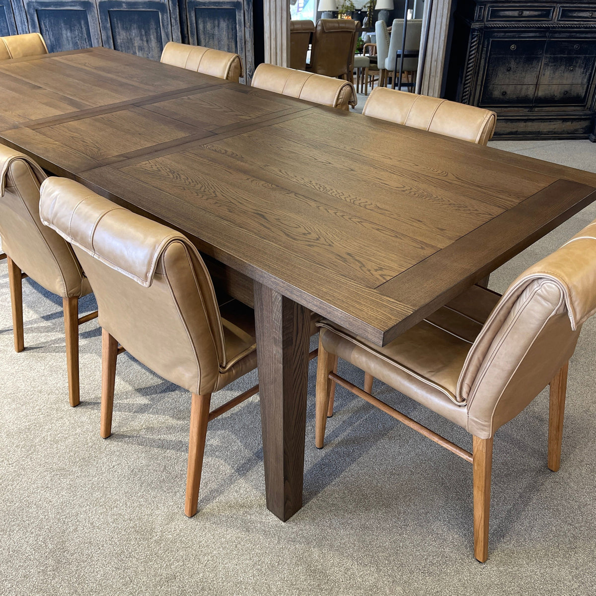 Dining table with chairs in a room setting