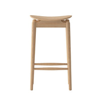 Wooden bar stool on a white background