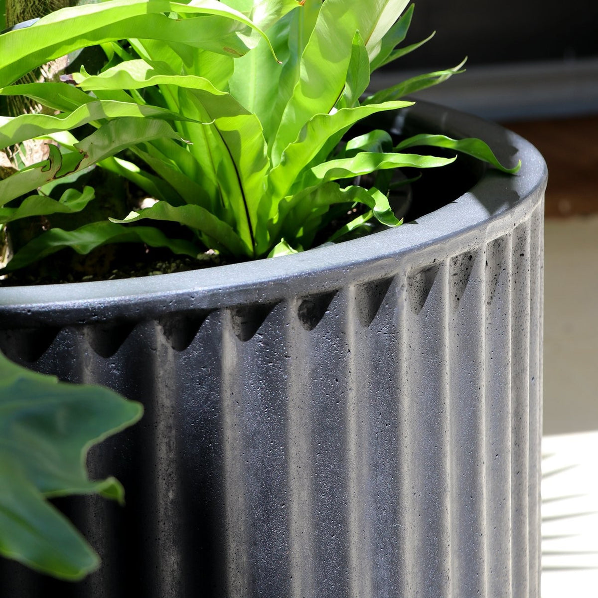 black ribbed plant pot Piako Ribbed Black Outdoor Planter Pot